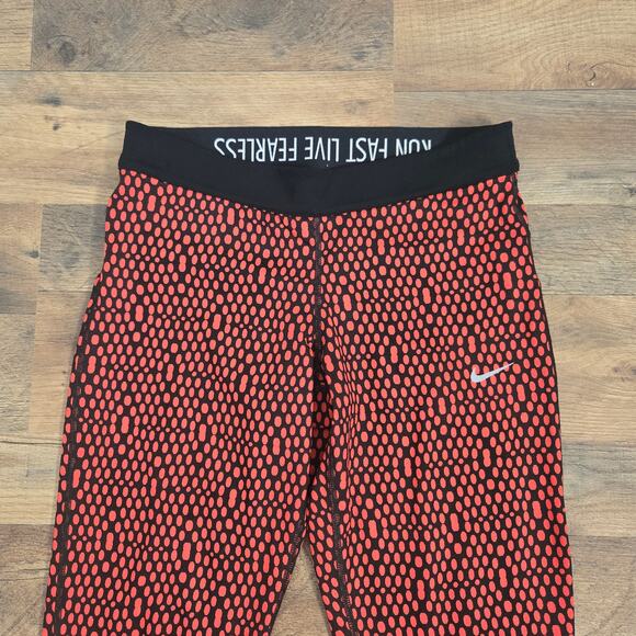 Nike Pants - Nike Women’s Running Stretch Leggings Black w/ Red Dot Design Size M